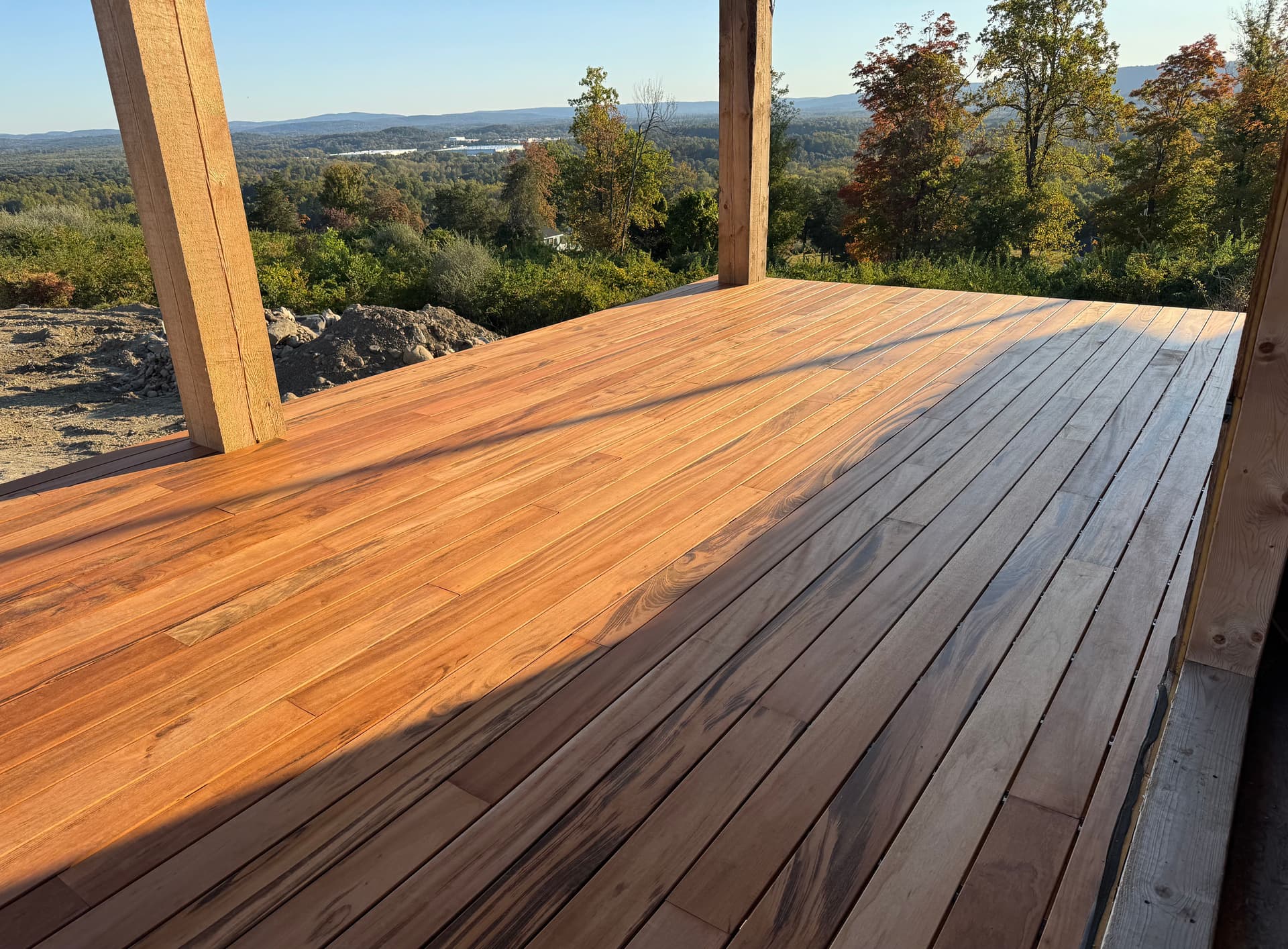 Custom Outdoor Spaces Built with Tigerdeck and Walnut Railing image