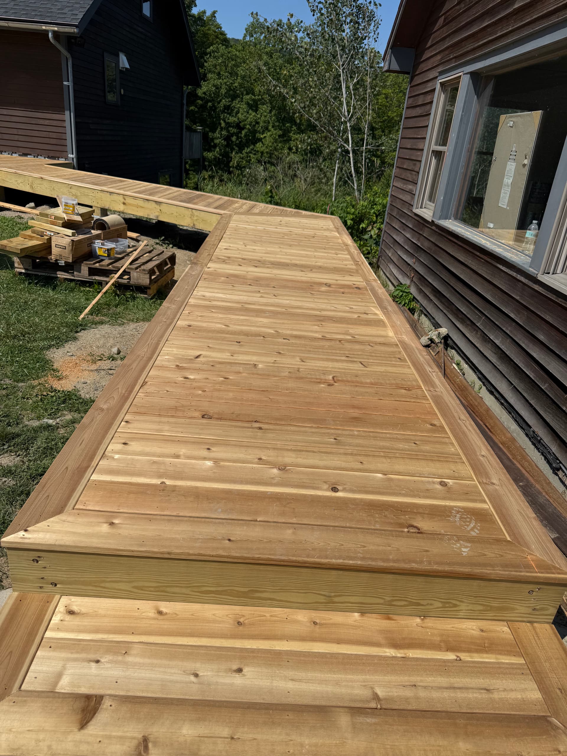 Gallery photos for Custom Outdoor Spaces Built with Tigerdeck and Walnut Railing: Image #6