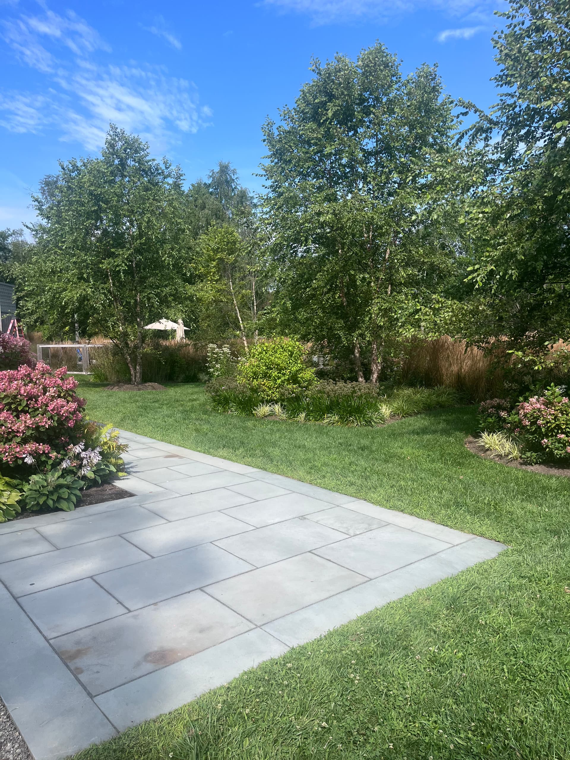 Bluestone, Landscape Walls, and Planting Beds Done Right image