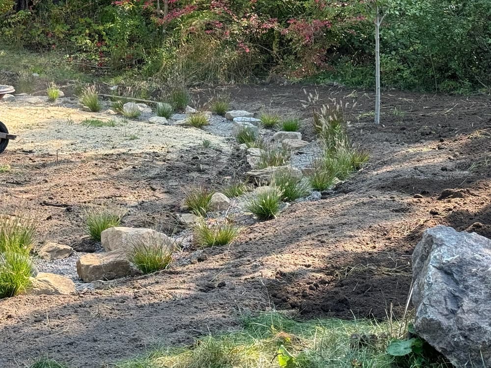 Dry Creek Bed and Ornamental Grass Installation in Wappingers Falls image